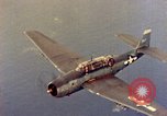 Image of U.S. Navy Grumman TBF avenger aircraft attacking Japanese Iwo Jima, 1945, second 49 stock footage video 65675040325