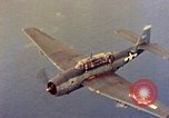 Image of U.S. Navy Grumman TBF avenger aircraft attacking Japanese Iwo Jima, 1945, second 50 stock footage video 65675040325