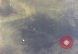 Image of U.S. Navy Grumman TBF avenger aircraft attacking Japanese Iwo Jima, 1945, second 53 stock footage video 65675040325