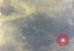 Image of U.S. Navy Grumman TBF avenger aircraft attacking Japanese Iwo Jima, 1945, second 54 stock footage video 65675040325