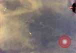 Image of U.S. Navy Grumman TBF avenger aircraft attacking Japanese Iwo Jima, 1945, second 57 stock footage video 65675040325