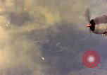 Image of U.S. Navy Grumman TBF avenger aircraft attacking Japanese Iwo Jima, 1945, second 59 stock footage video 65675040325