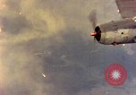 Image of U.S. Navy Grumman TBF avenger aircraft attacking Japanese Iwo Jima, 1945, second 60 stock footage video 65675040325