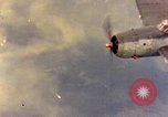 Image of U.S. Navy Grumman TBF avenger aircraft attacking Japanese Iwo Jima, 1945, second 61 stock footage video 65675040325
