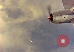 Image of U.S. Navy Grumman TBF avenger aircraft attacking Japanese Iwo Jima, 1945, second 62 stock footage video 65675040325
