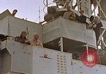 Image of General Motors FM-2 Wildcat aircraft landing on escort carrier Iwo Jima, 1945, second 1 stock footage video 65675040327