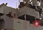 Image of General Motors FM-2 Wildcat aircraft landing on escort carrier Iwo Jima, 1945, second 3 stock footage video 65675040327
