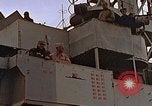 Image of General Motors FM-2 Wildcat aircraft landing on escort carrier Iwo Jima, 1945, second 4 stock footage video 65675040327