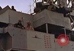 Image of General Motors FM-2 Wildcat aircraft landing on escort carrier Iwo Jima, 1945, second 5 stock footage video 65675040327