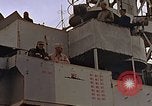 Image of General Motors FM-2 Wildcat aircraft landing on escort carrier Iwo Jima, 1945, second 6 stock footage video 65675040327