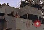 Image of General Motors FM-2 Wildcat aircraft landing on escort carrier Iwo Jima, 1945, second 8 stock footage video 65675040327