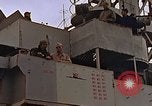 Image of General Motors FM-2 Wildcat aircraft landing on escort carrier Iwo Jima, 1945, second 9 stock footage video 65675040327