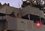 Image of General Motors FM-2 Wildcat aircraft landing on escort carrier Iwo Jima, 1945, second 10 stock footage video 65675040327
