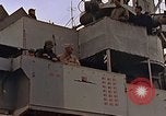 Image of General Motors FM-2 Wildcat aircraft landing on escort carrier Iwo Jima, 1945, second 11 stock footage video 65675040327