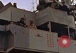 Image of General Motors FM-2 Wildcat aircraft landing on escort carrier Iwo Jima, 1945, second 13 stock footage video 65675040327