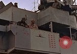 Image of General Motors FM-2 Wildcat aircraft landing on escort carrier Iwo Jima, 1945, second 14 stock footage video 65675040327