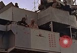 Image of General Motors FM-2 Wildcat aircraft landing on escort carrier Iwo Jima, 1945, second 15 stock footage video 65675040327
