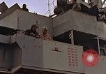Image of General Motors FM-2 Wildcat aircraft landing on escort carrier Iwo Jima, 1945, second 16 stock footage video 65675040327