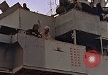 Image of General Motors FM-2 Wildcat aircraft landing on escort carrier Iwo Jima, 1945, second 17 stock footage video 65675040327