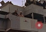Image of General Motors FM-2 Wildcat aircraft landing on escort carrier Iwo Jima, 1945, second 18 stock footage video 65675040327