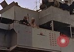 Image of General Motors FM-2 Wildcat aircraft landing on escort carrier Iwo Jima, 1945, second 19 stock footage video 65675040327