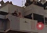 Image of General Motors FM-2 Wildcat aircraft landing on escort carrier Iwo Jima, 1945, second 21 stock footage video 65675040327