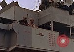 Image of General Motors FM-2 Wildcat aircraft landing on escort carrier Iwo Jima, 1945, second 22 stock footage video 65675040327