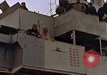 Image of General Motors FM-2 Wildcat aircraft landing on escort carrier Iwo Jima, 1945, second 23 stock footage video 65675040327