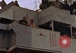 Image of General Motors FM-2 Wildcat aircraft landing on escort carrier Iwo Jima, 1945, second 24 stock footage video 65675040327