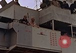 Image of General Motors FM-2 Wildcat aircraft landing on escort carrier Iwo Jima, 1945, second 25 stock footage video 65675040327
