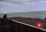 Image of General Motors FM-2 Wildcat aircraft landing on escort carrier Iwo Jima, 1945, second 34 stock footage video 65675040327