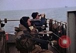 Image of Crew at work on escort carrier of Task Group 52.2  Pacific Ocean, 1945, second 1 stock footage video 65675040328