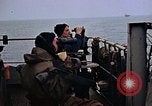 Image of Crew at work on escort carrier of Task Group 52.2  Pacific Ocean, 1945, second 4 stock footage video 65675040328