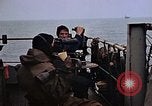 Image of Crew at work on escort carrier of Task Group 52.2  Pacific Ocean, 1945, second 5 stock footage video 65675040328