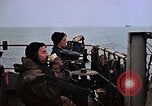Image of Crew at work on escort carrier of Task Group 52.2  Pacific Ocean, 1945, second 11 stock footage video 65675040328