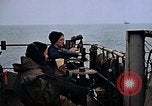 Image of Crew at work on escort carrier of Task Group 52.2  Pacific Ocean, 1945, second 12 stock footage video 65675040328