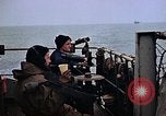 Image of Crew at work on escort carrier of Task Group 52.2  Pacific Ocean, 1945, second 13 stock footage video 65675040328