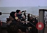 Image of Crew at work on escort carrier of Task Group 52.2  Pacific Ocean, 1945, second 15 stock footage video 65675040328