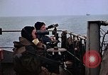 Image of Crew at work on escort carrier of Task Group 52.2  Pacific Ocean, 1945, second 16 stock footage video 65675040328