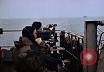 Image of Crew at work on escort carrier of Task Group 52.2  Pacific Ocean, 1945, second 18 stock footage video 65675040328