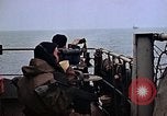 Image of Crew at work on escort carrier of Task Group 52.2  Pacific Ocean, 1945, second 19 stock footage video 65675040328