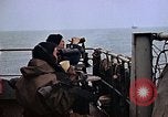 Image of Crew at work on escort carrier of Task Group 52.2  Pacific Ocean, 1945, second 20 stock footage video 65675040328