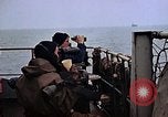 Image of Crew at work on escort carrier of Task Group 52.2  Pacific Ocean, 1945, second 21 stock footage video 65675040328