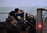 Image of Crew at work on escort carrier of Task Group 52.2  Pacific Ocean, 1945, second 23 stock footage video 65675040328