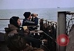 Image of Crew at work on escort carrier of Task Group 52.2  Pacific Ocean, 1945, second 25 stock footage video 65675040328