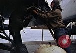 Image of Crew at work on escort carrier of Task Group 52.2  Pacific Ocean, 1945, second 30 stock footage video 65675040328