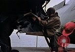 Image of Crew at work on escort carrier of Task Group 52.2  Pacific Ocean, 1945, second 34 stock footage video 65675040328
