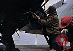 Image of Crew at work on escort carrier of Task Group 52.2  Pacific Ocean, 1945, second 37 stock footage video 65675040328