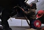Image of Crew at work on escort carrier of Task Group 52.2  Pacific Ocean, 1945, second 39 stock footage video 65675040328