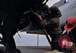 Image of Crew at work on escort carrier of Task Group 52.2  Pacific Ocean, 1945, second 40 stock footage video 65675040328